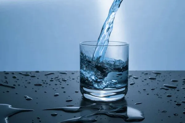 Clean water being poured into a glass